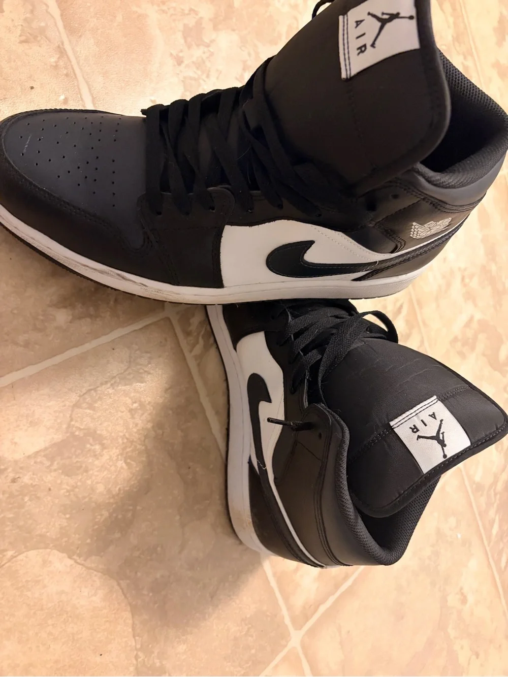 Nike Black and White Mid-Top Sneakers